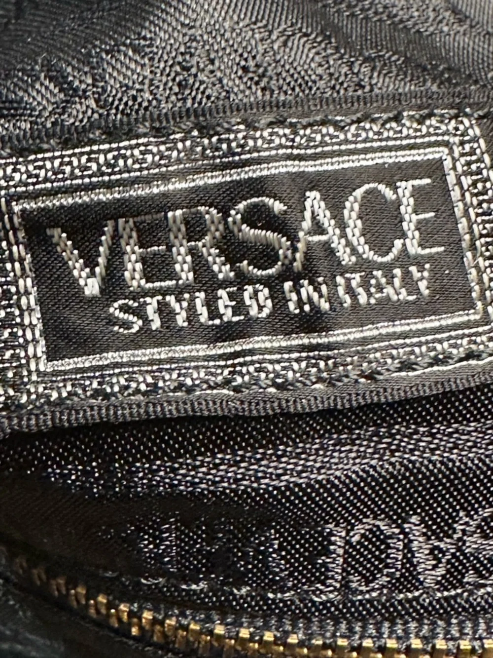 Versace Unisex Black Leather Duffel with Gold Medallion